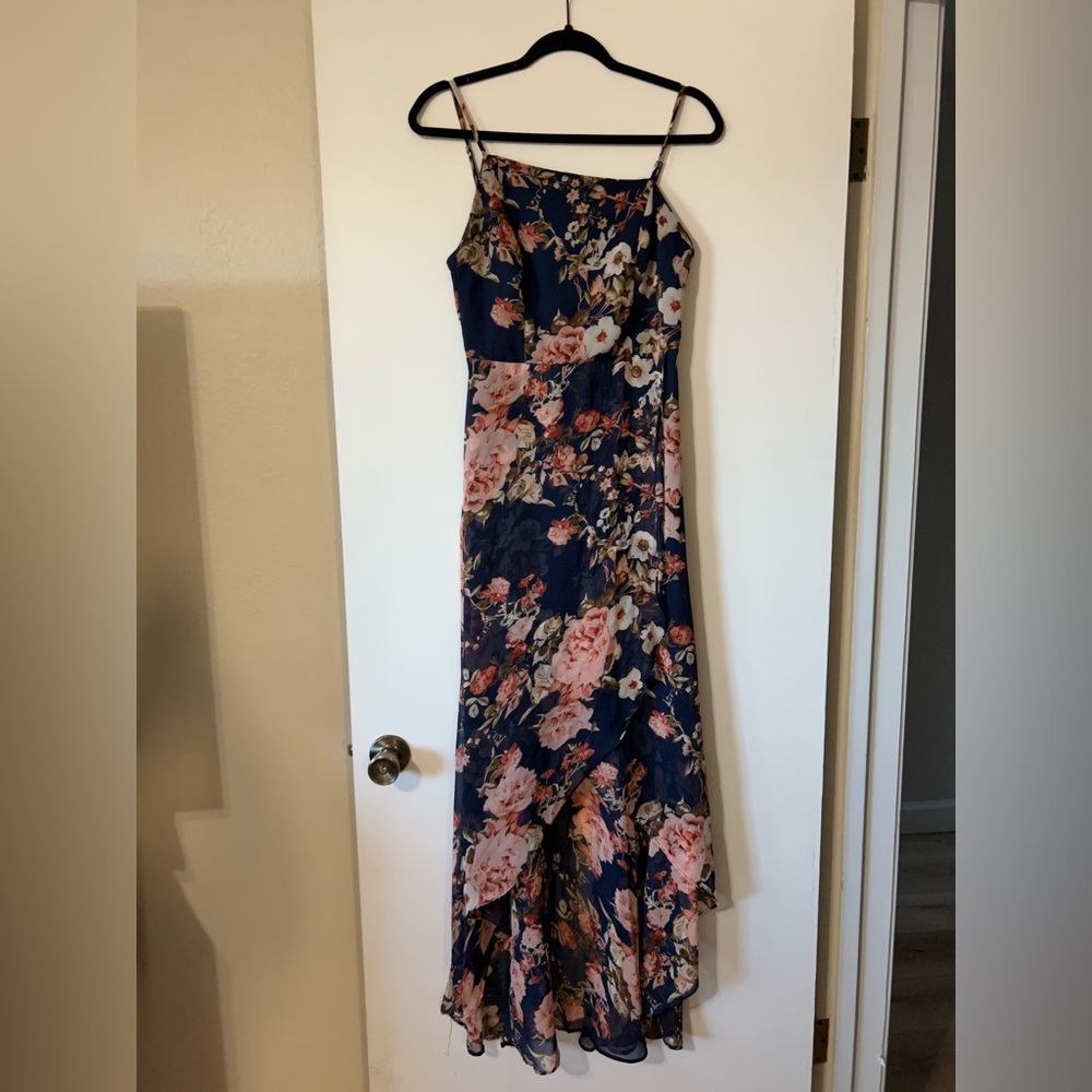 Floral high-low dress with asymmetrical neck line. Lightly worn.